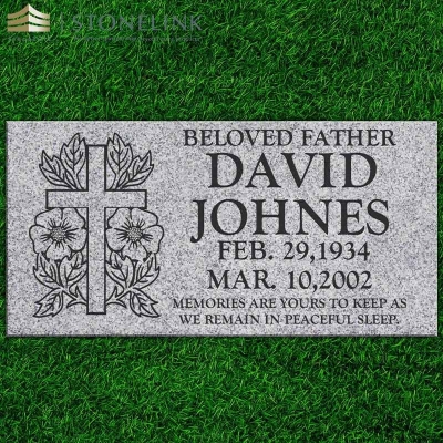 Grey granite flat headstone