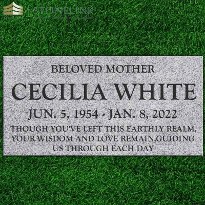 Grey granite flat headstone