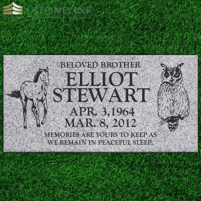 Grey granite flat headstone