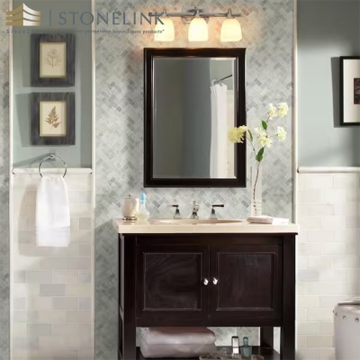 Arabescato Carrara herringbone honed marble mosaic