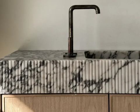 Why Are Designers Obsessed with Grooved Stone Surfaces?